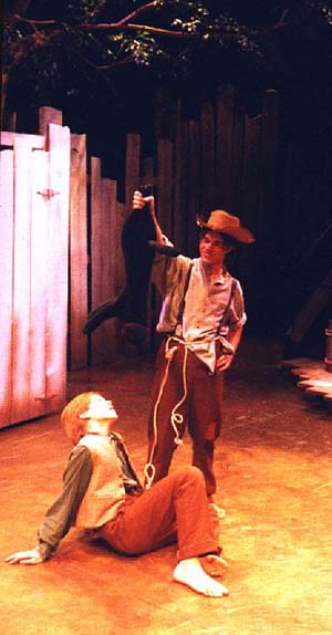 Tom and Huck prepare to remove warts...